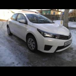 Автомобиль Toyota Corolla XI E160 седан
